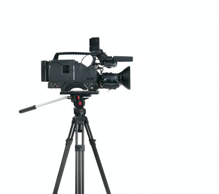 Professional digital video camera on white background
